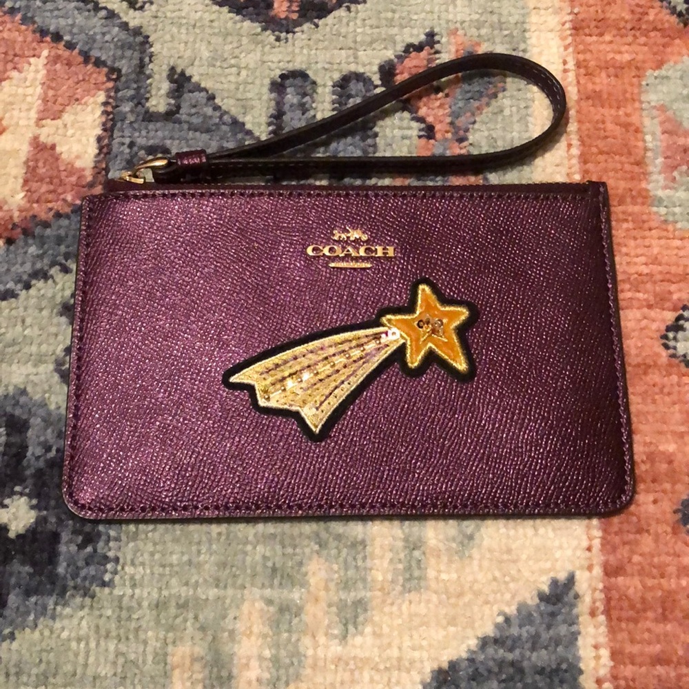 Coach shooting star purple wristlet